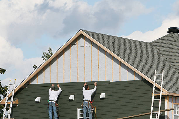 Professional Siding Contractor technician working in Marshall, IL